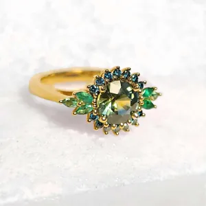 14K Montana Sapphire, Blue Diamond, and Emerald Ring