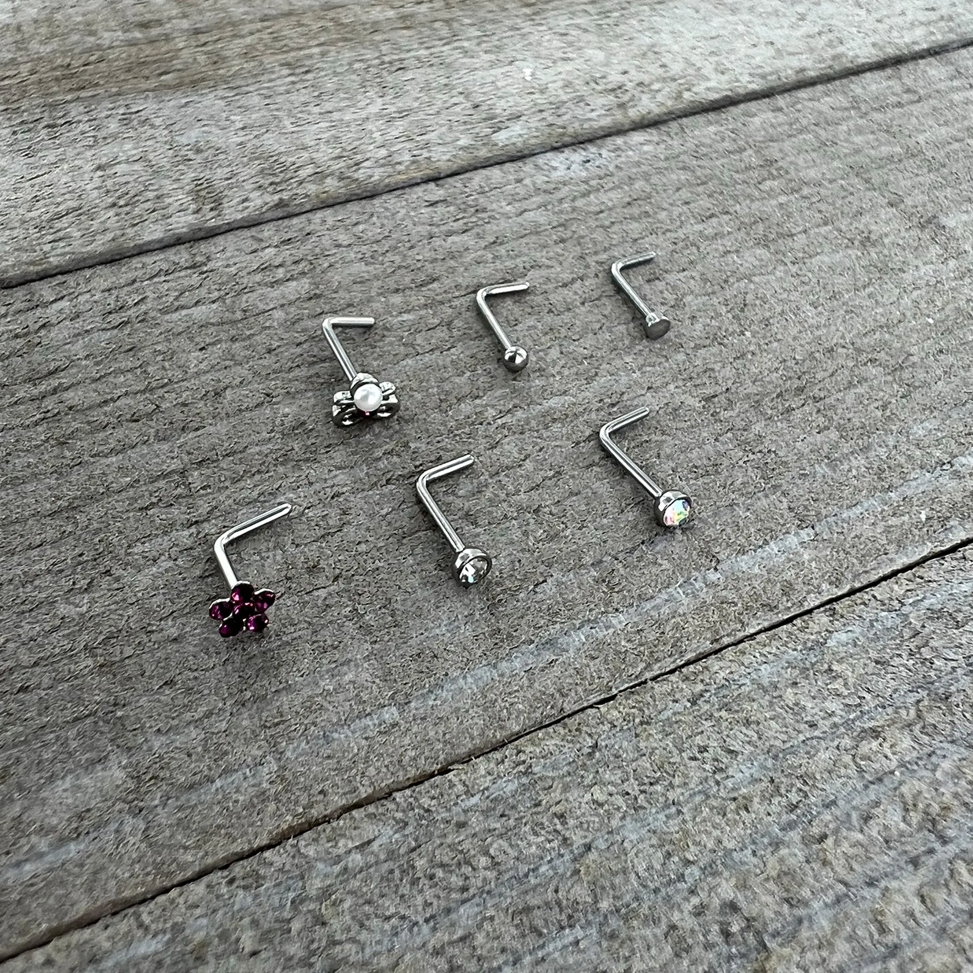 20 Gauge 1/4 Aurora Purple CZ Gem Flower Bow L Shape Nose Ring Set of 6