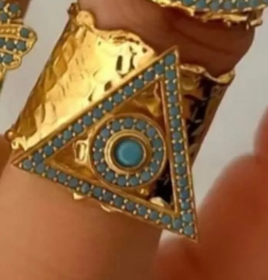 Bande de Vagabonds handmade brass adjustable rings with tuquoise stone inlayed adorned mascots to chose from: Starfish, Evil Eye, Pyramid of Wisdom, Butterfly, Beatle and Bumble Bee Beautiful medium sized eye catching statement rings