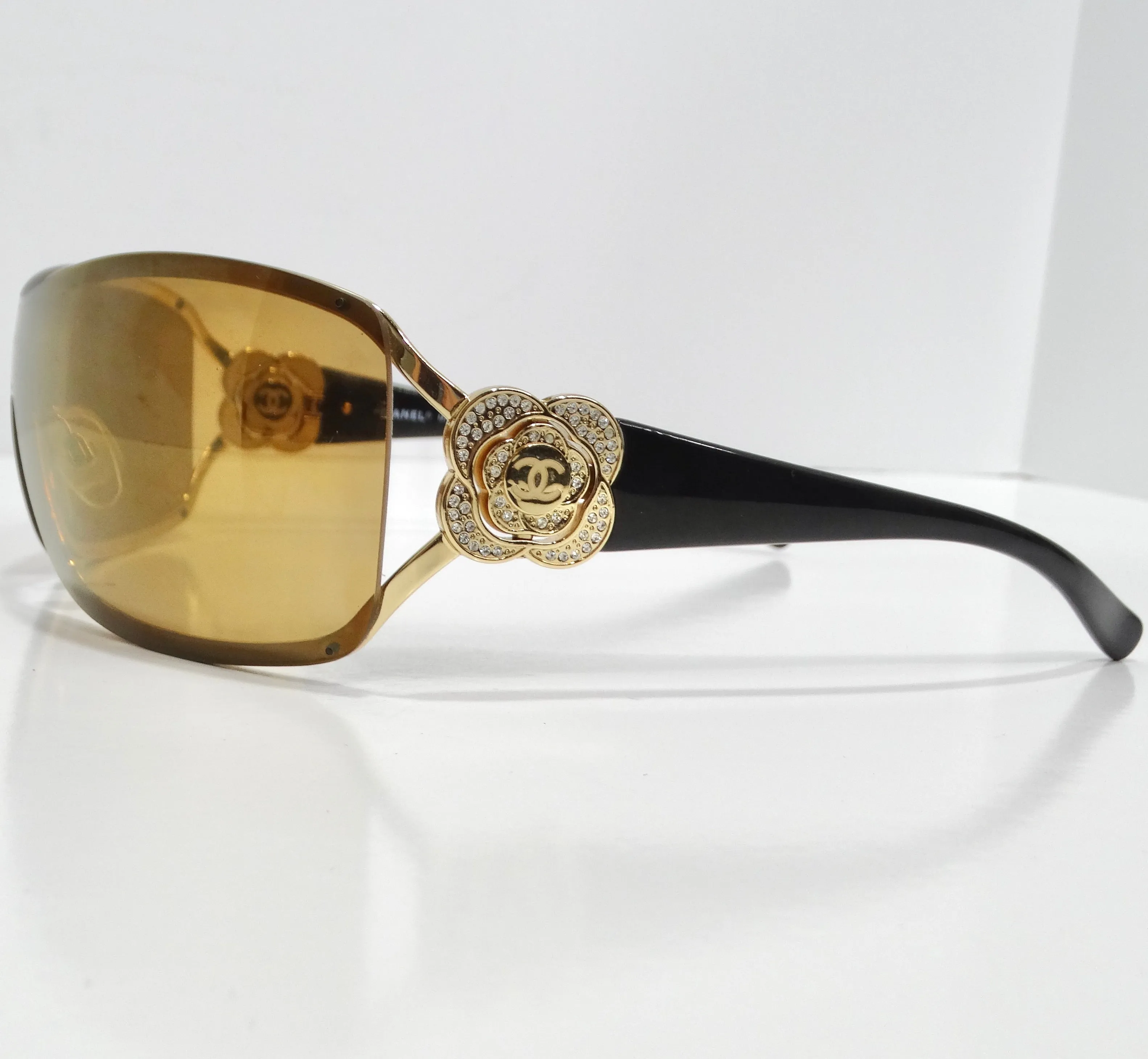 Chanel 1990s Gold Tone Camelia Shield Sunglasses