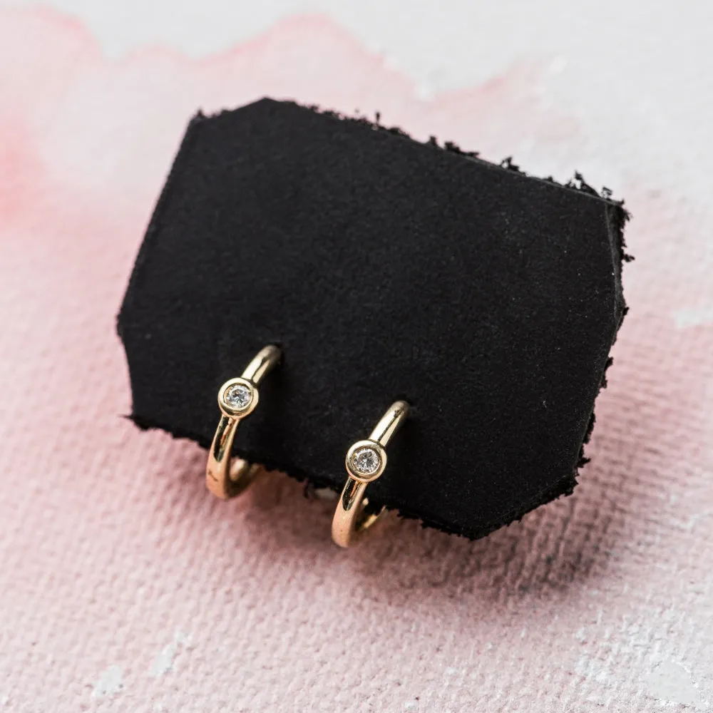 Diamond Accent Huggie Earrings in 14k Gold