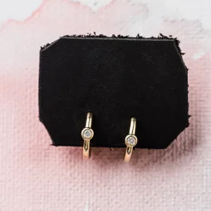 Diamond Accent Huggie Earrings in 14k Gold