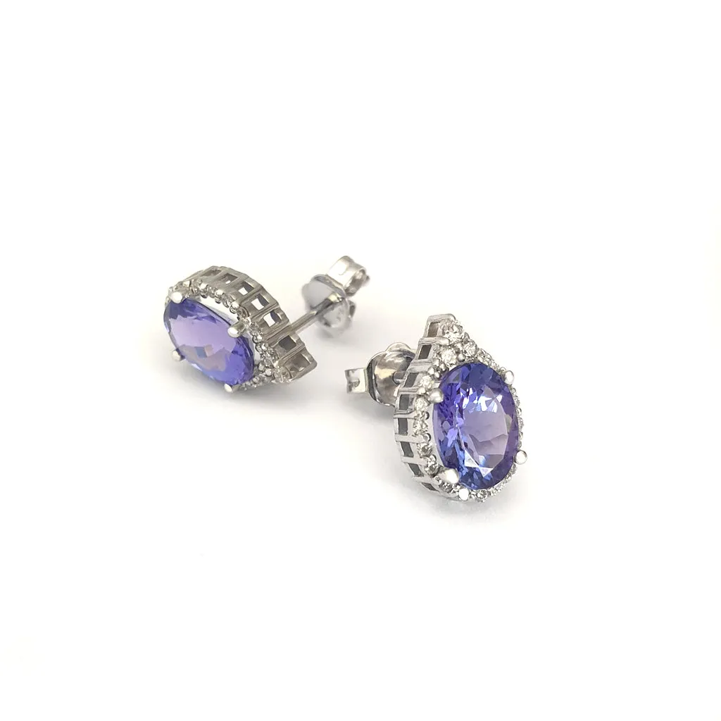 Enchanting Oval Tanzanite Trilogy Detail Diamond Halo Earrings