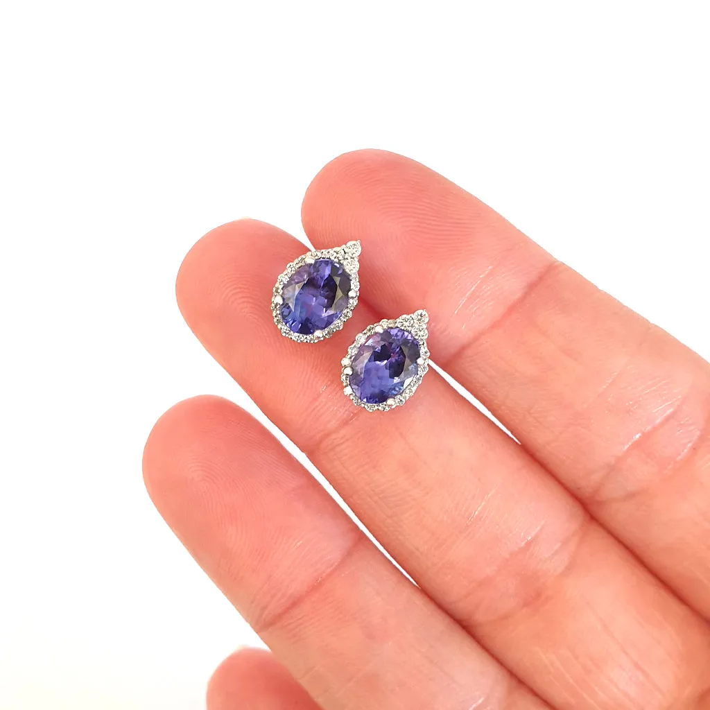 Enchanting Oval Tanzanite Trilogy Detail Diamond Halo Earrings