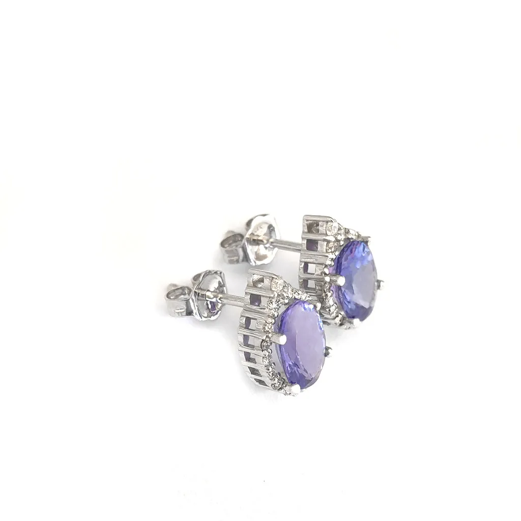 Enchanting Oval Tanzanite Trilogy Detail Diamond Halo Earrings