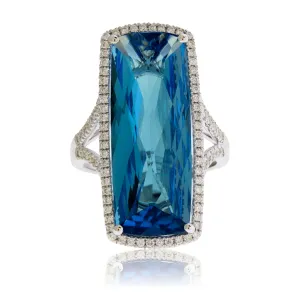 Fancy Cut Oval London Blue Topaz with Diamond Halo Ring