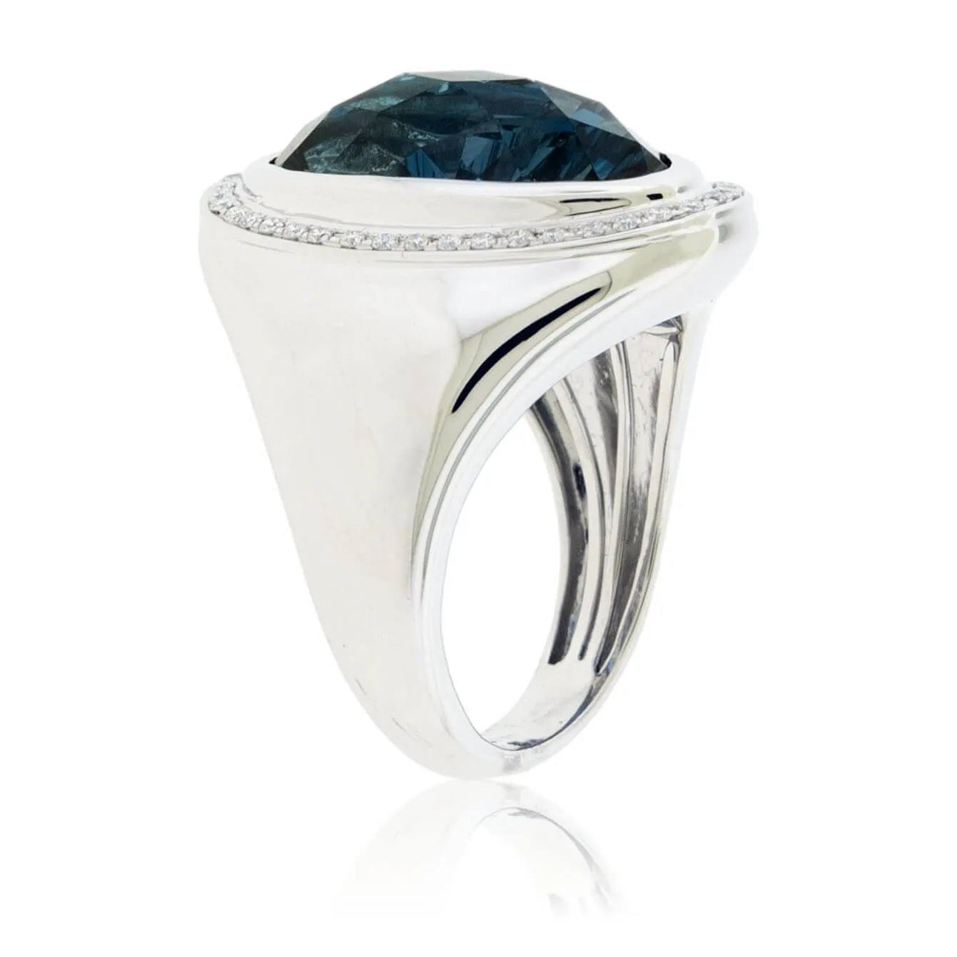 Fancy Cut Oval London Blue Topaz with Diamond Halo Ring
