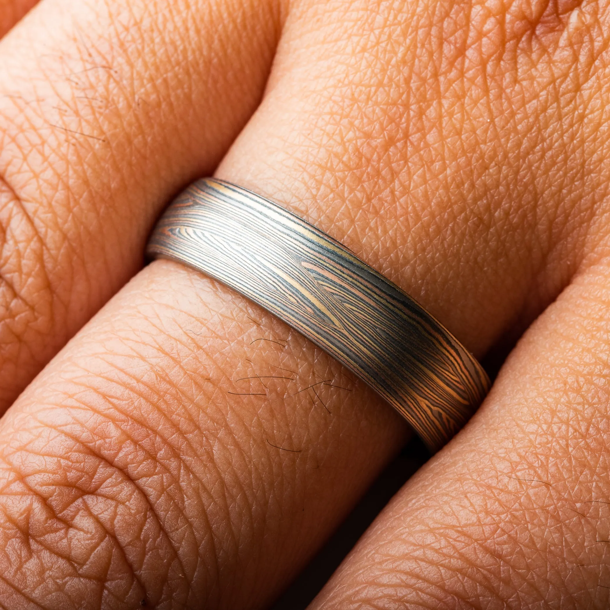 Handcrafted Mokume Gane Ring in Flow Pattern with Mokume Knots and Firestorm Palette