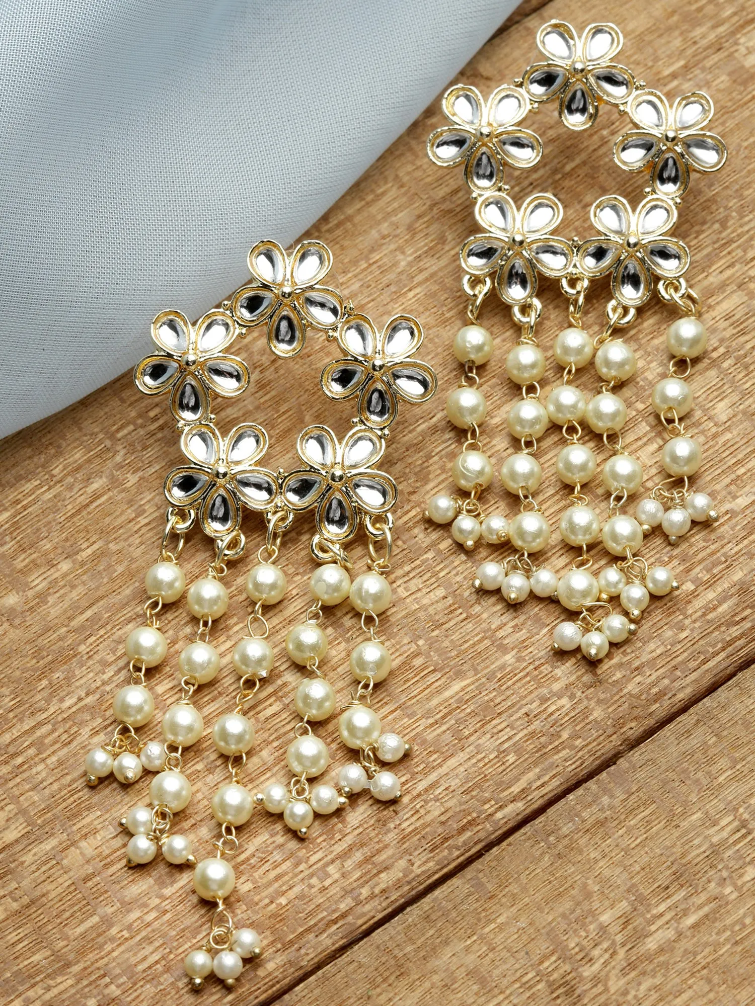 Karatcart Gold Plated Floral Design Kundan Pearl Tassel Earrings for Women