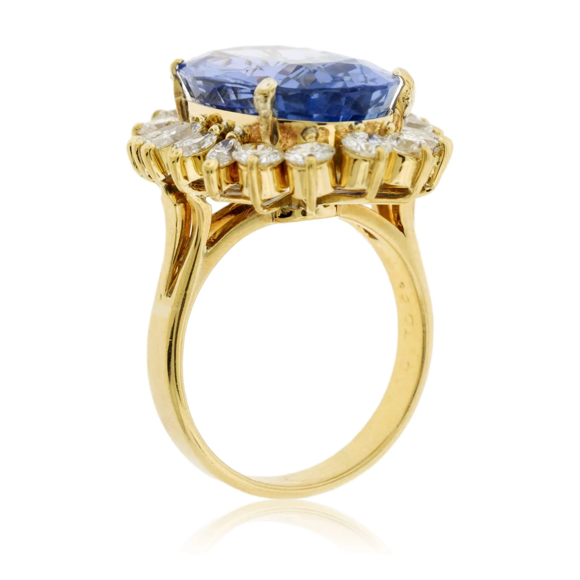 Large Oval Blue Sapphire with Round and Marquise Diamond Halo Style Ring
