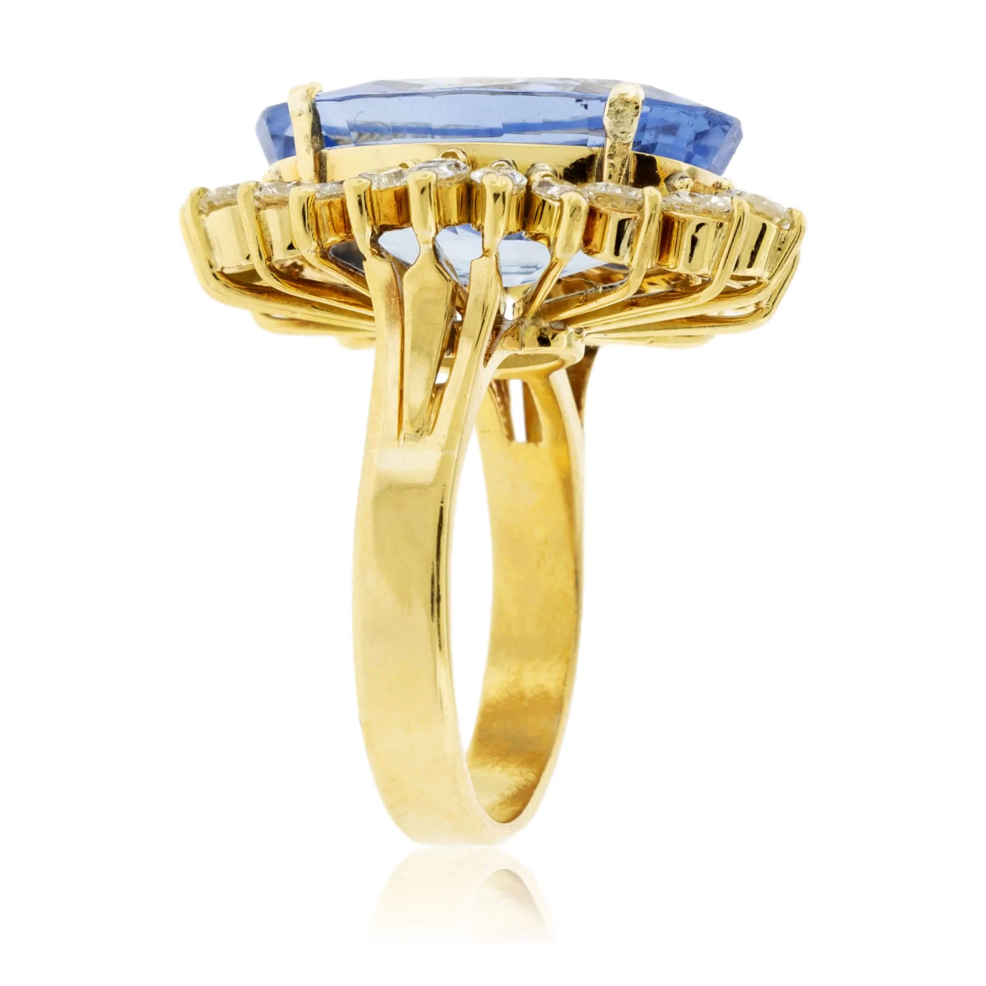 Large Oval Blue Sapphire with Round and Marquise Diamond Halo Style Ring